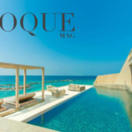 Ambiente à beira-mar que traduz a estética da nova edição da Evoque Magazine, associando exclusividade, arquitetura e experiência